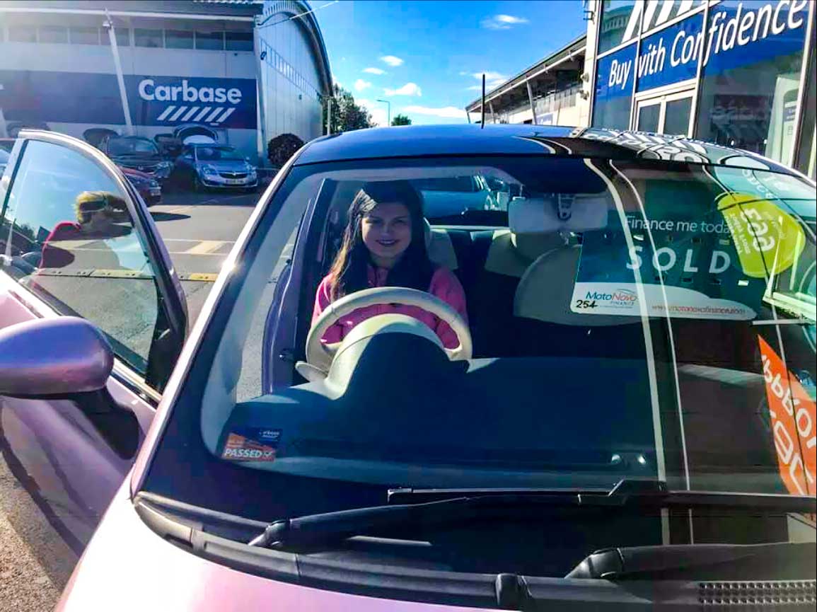 A newly qualified driver in her new Carbase car
