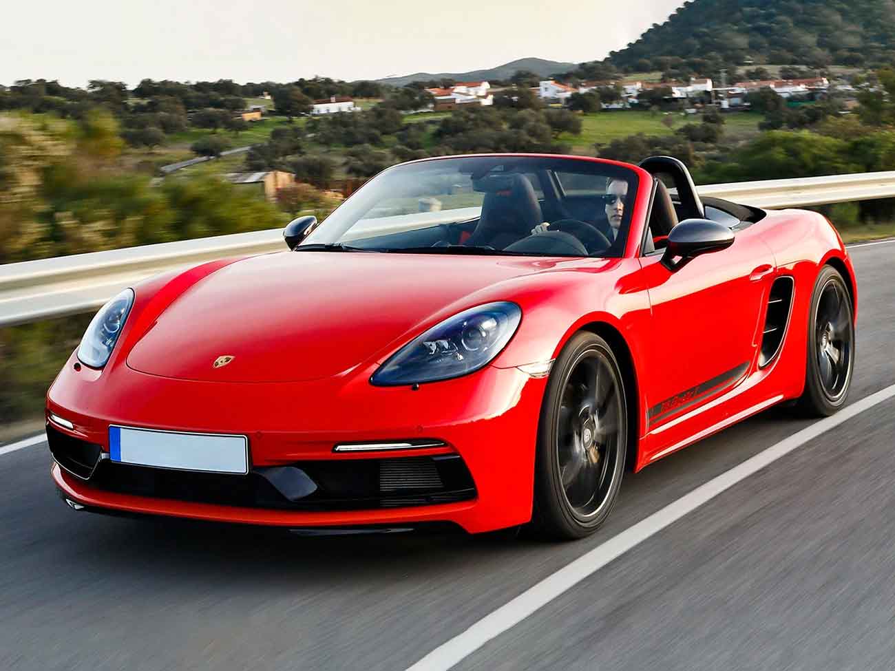 A Porsche Boxster in red