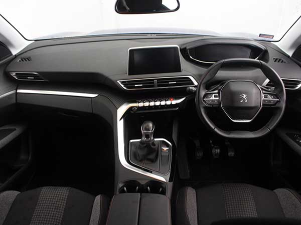 Internal dashboard view of Peugeot 3008 SUV in showroom