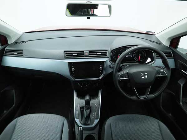 Internal dashboard view of Seat Arona SUV in showroom