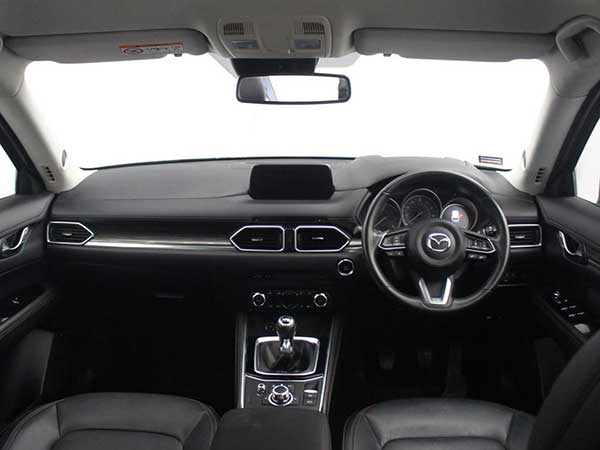 Internal dashboard view of Mazda CX 5 SUV in showroom