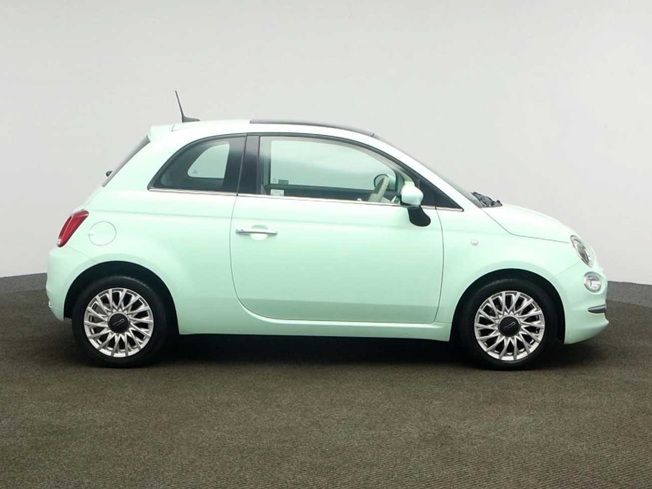 Side view of Fiat 500 in showroom