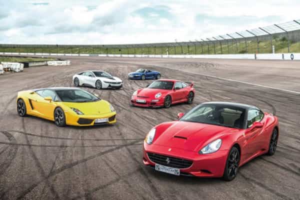 Selection of super cars on race track