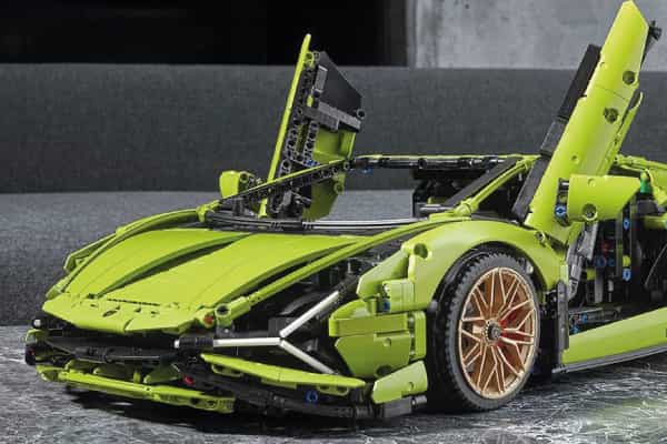 Green super car lego built with car doors open