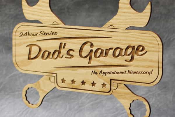 Personalised wooden engraved garage sign labelled dads garage